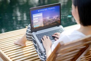 Travel booking concept, tourist buying tour online