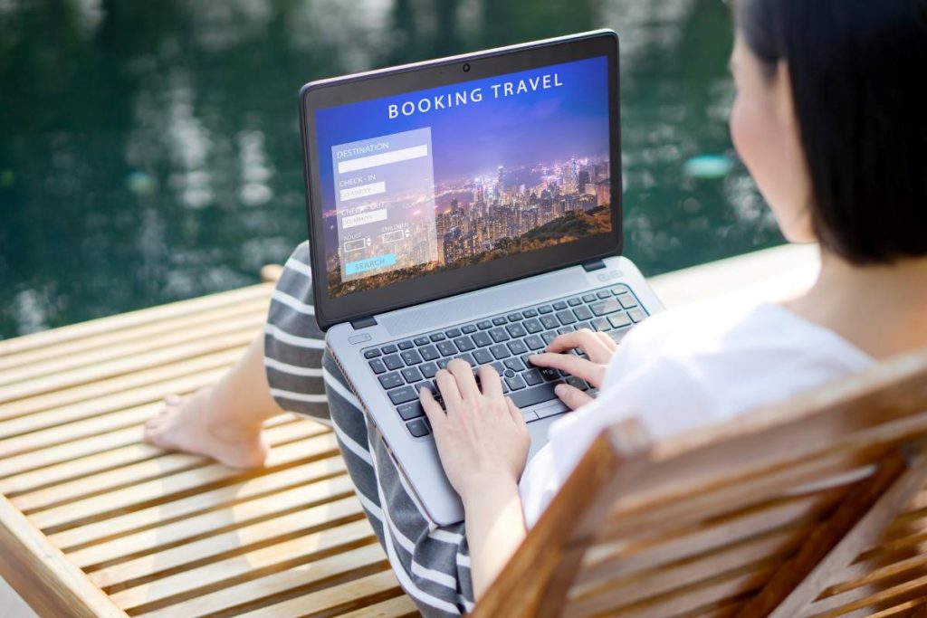 Travel booking concept, tourist buying tour online