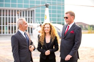 Successful business people standing together widen out showing strong relationship of worker community